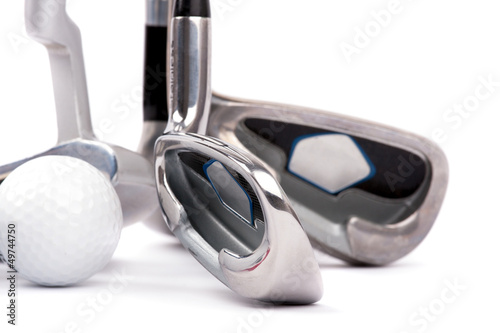 Photo: golf club with ball on white background golf club with ball on white background