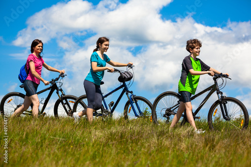 Photo: Active family biking Active family biking
