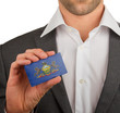 Businessman is holding a business card, Pennsylvania