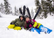 Teenage girl and boy skiing