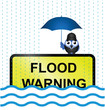 Half submerged flood warning sign