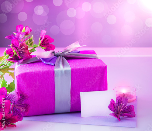 Photo: Luxury gift with pink flowers Luxury gift with pink flowers