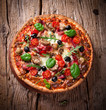 Delicious italian pizza served on wooden table