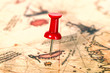 Photo: Thumbtack in the world map Thumbtack in the world map