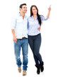 Happy couple pointing away