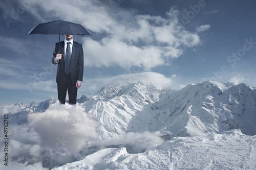Photo: businessman with umbrella businessman with umbrella