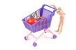 Conceptual photo with miniature shopping-cart
