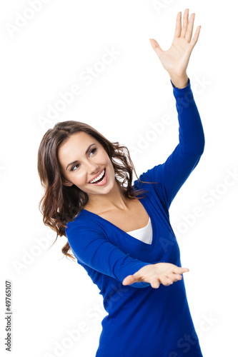 Photo: Woman carring, holding or showing something Woman carring, holding or showing something