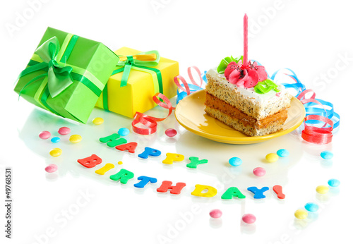 Photo: Colorful birthday cake with candle and gifts isolated on white Colorful birthday cake with candle and gifts isolated on white