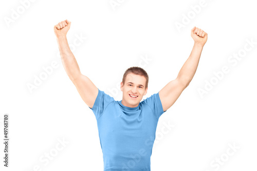 Photo: A handsome guy gesturing happiness A handsome guy gesturing happiness