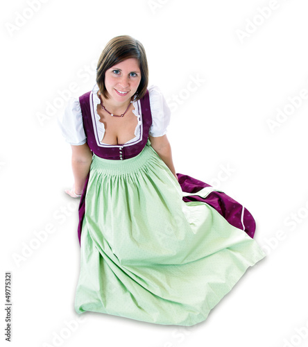 Photo: Junge, sitzende Frau im Dirndl Junge, sitzende Frau im Dirndl
