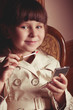 Beautiful little girl in dress in vintage style