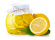 Lemon jam with ripe fruits isolated on white