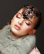 Passion. Glamorous Dreamy Woman in Fur Mantle and Jewels. Luxury