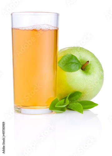 Photo: Apple juice in glass and green juicy apple with green leaf on wh Apple juice in glass and green juicy apple with green leaf on wh