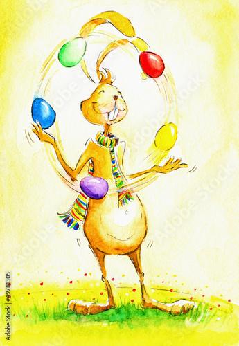 Photo: Easter bunny juggling with easter eggs. Easter bunny juggling with easter eggs.