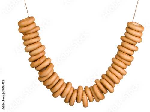 Photo: Sheaf of bagels isolated on white Sheaf of bagels isolated on white
