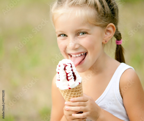 Photo: little girl with ice-cream little girl with ice-cream
