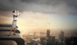 Business woman with telescope