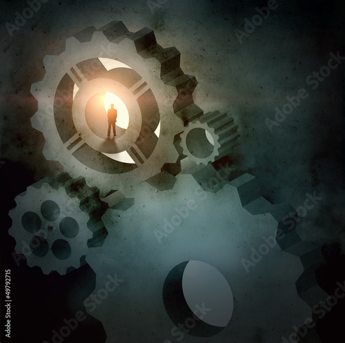 Photo: Businessman silhouette in picture of mechanism Businessman silhouette in picture of mechanism