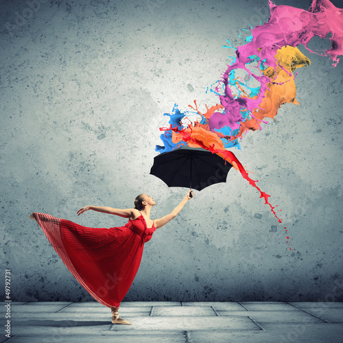 Photo: Ballet dancer in flying satin dress with umbrella Ballet dancer in flying satin dress with umbrella