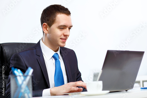Photo: Young businessman in the office Young businessman in the office