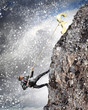 busiessman climbing mountain