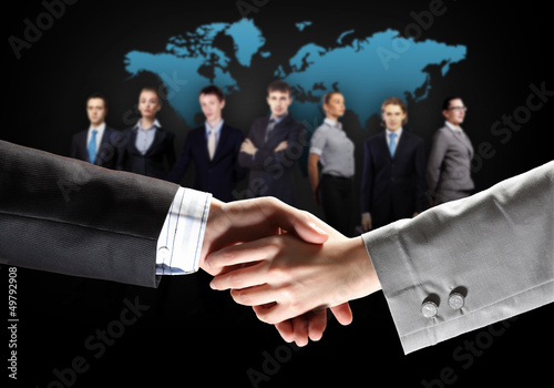 Photo: image of business handshake image of business handshake