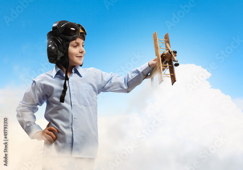 Photo: Little boy in pilot's hat Little boy in pilot's hat