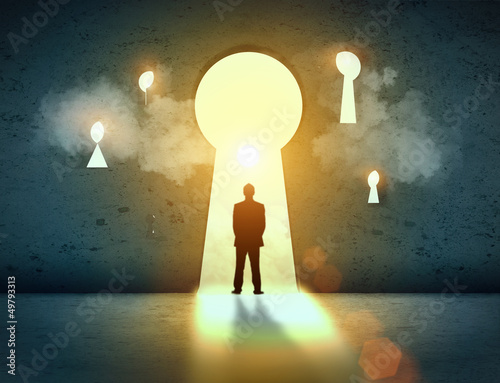 Photo: Silhouette of businessman in keyhole Silhouette of businessman in keyhole