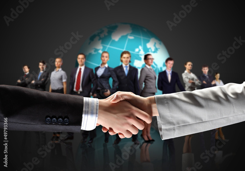 Photo: image of business handshake image of business handshake