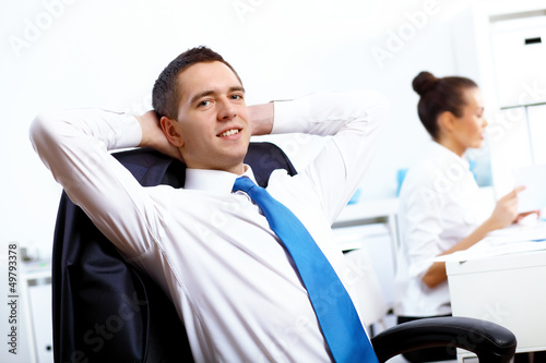 Photo: Young businesswoman in the office Young businesswoman in the office