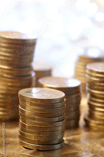 Photo: coins on the gold background coins on the gold background