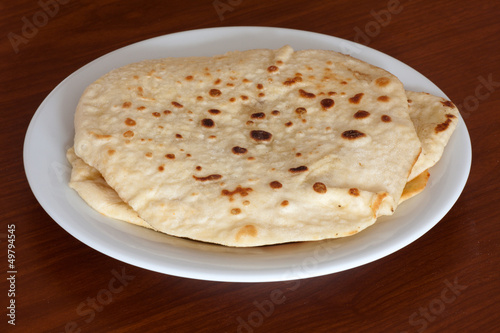 Photo: Stack of flour tortillas on plate Stack of flour tortillas on plate