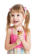 happy child girl eating ice cream in studio isolated