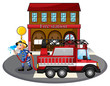 A fireman holding a hose near a firetruck