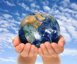 Hands of woman holding globe, Africa and Near East