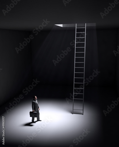 Illustration: A lonely man standing in a spot of light A lonely man standing in a spot of light