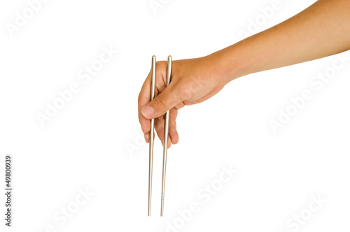 Photo: isolated hand holding chopstick isolated hand holding chopstick