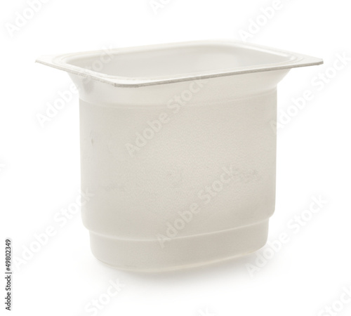 Photo: Empty plastic yoghurt pot on white Empty plastic yoghurt pot on white