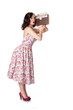 Retro girl with vintage radio on white