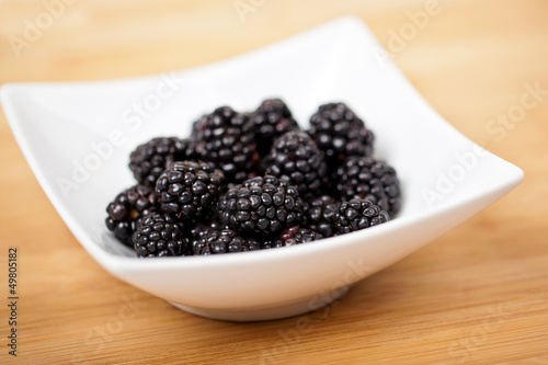 Photo: Blackberries in a small bowl Blackberries in a small bowl