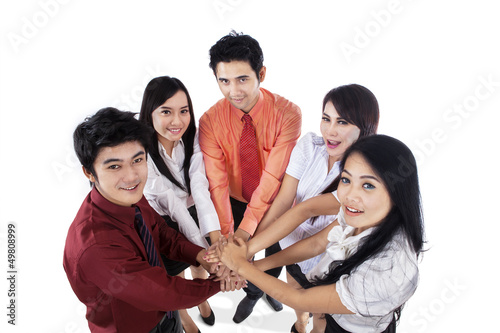 Photo: Business team join hands Business team join hands