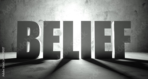 Photo: Belief word with shadow, background Belief word with shadow, background