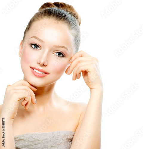 Photo: Beauty Teenage Girl Portrait isolated on a White Background Beauty Teenage Girl Portrait isolated on a White Background