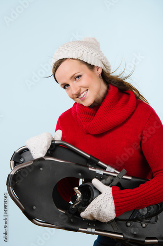 Photo: Woman and snowshoes Woman and snowshoes
