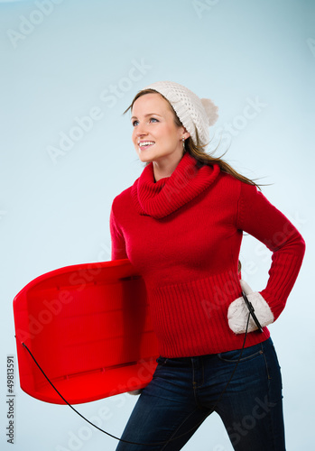 Photo: Woman and sled Woman and sled