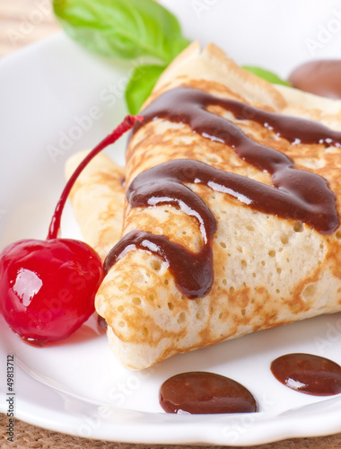 Photo: pancakes with chocolate and cherries pancakes with chocolate and cherries