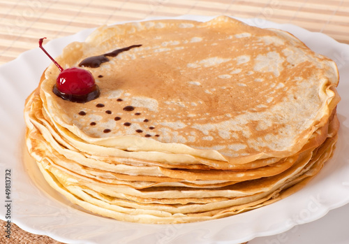 Photo: pancakes with chocolate and cherries pancakes with chocolate and cherries