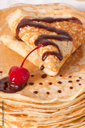 Photo: pancakes with chocolate and cherries pancakes with chocolate and cherries